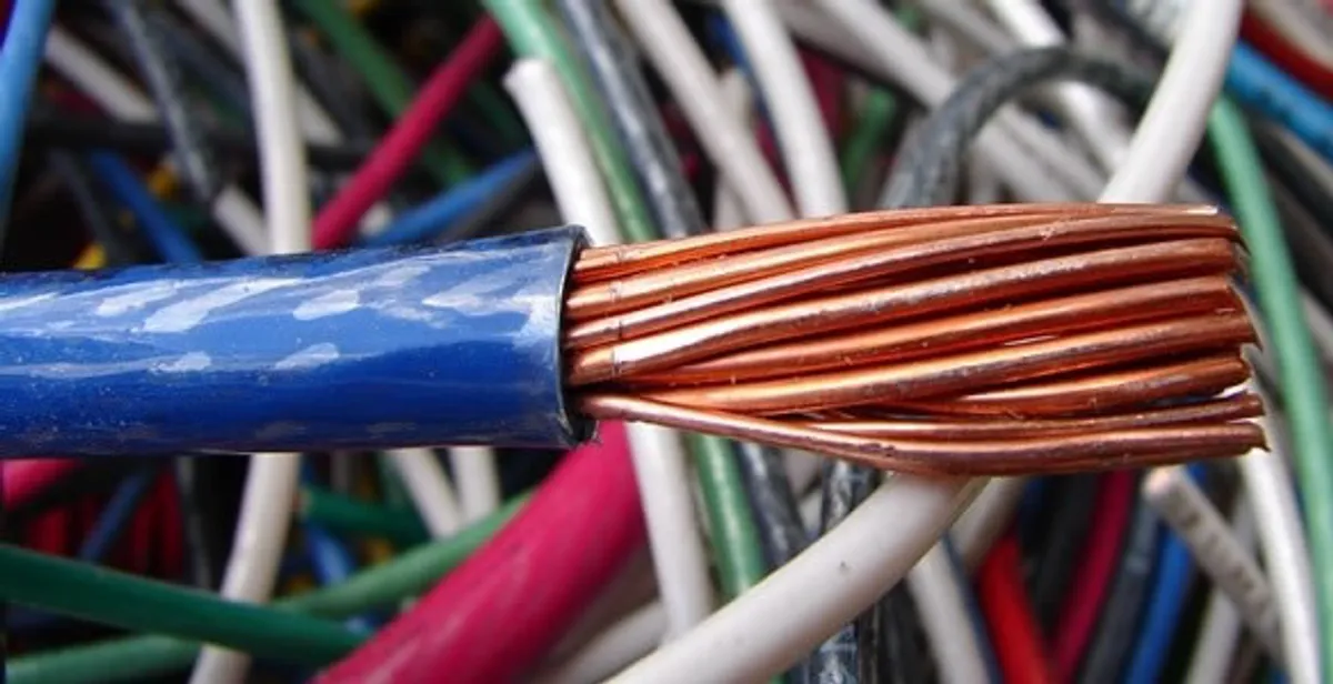 electrical wiring services showing exposed copper conductors and cable preparation in Glendale, AZ